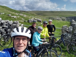 Over the top at Malham Cove - We deserve a photo after the two mile climb! 